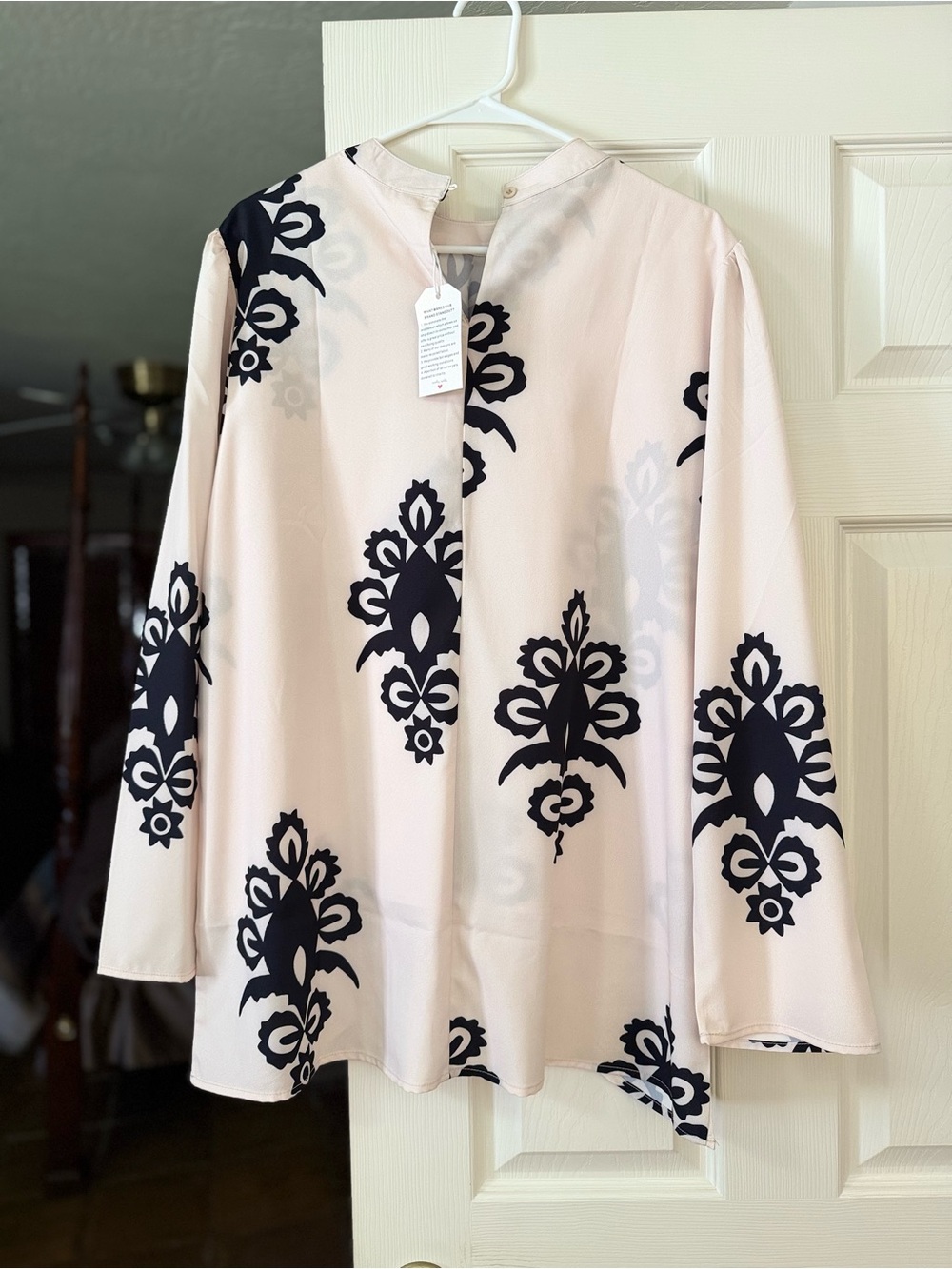 Women's White Long-Sleeve Blouse with Black Floral Motif
